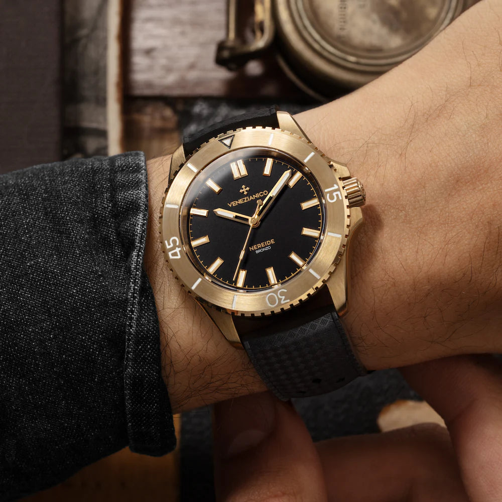 lateral nereide bronzo with tropic strap black worn on wrist