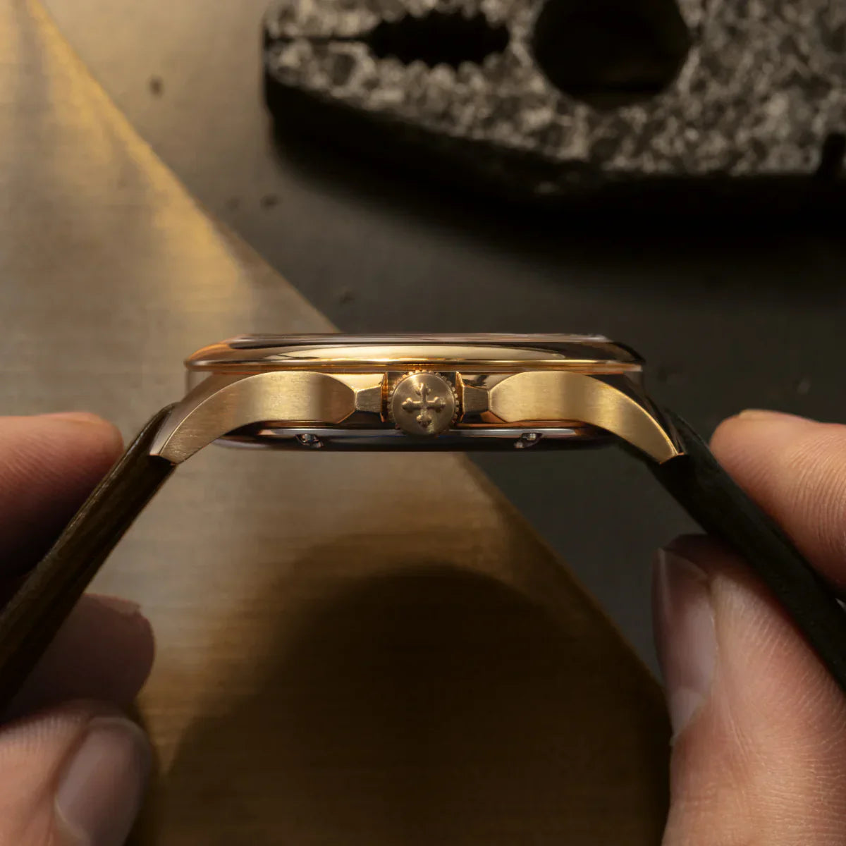 lateral detail redentore bronzo with bronze case brown dial